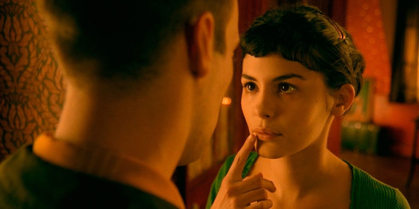Audrey Tautou talking to a man in Amélie