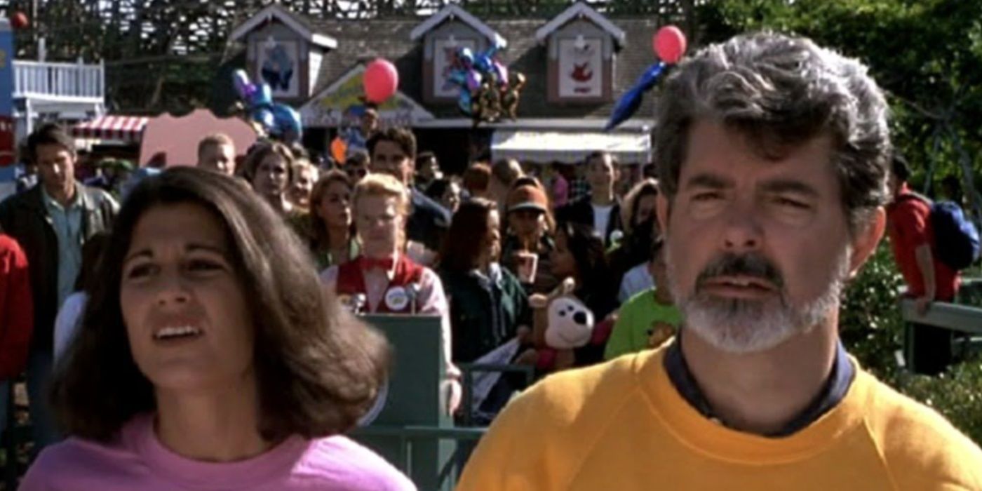 George Lucas wearing a yellow sweatshirt as Disappointed Man in John Landis' Beverly Hills Cop III (1994)